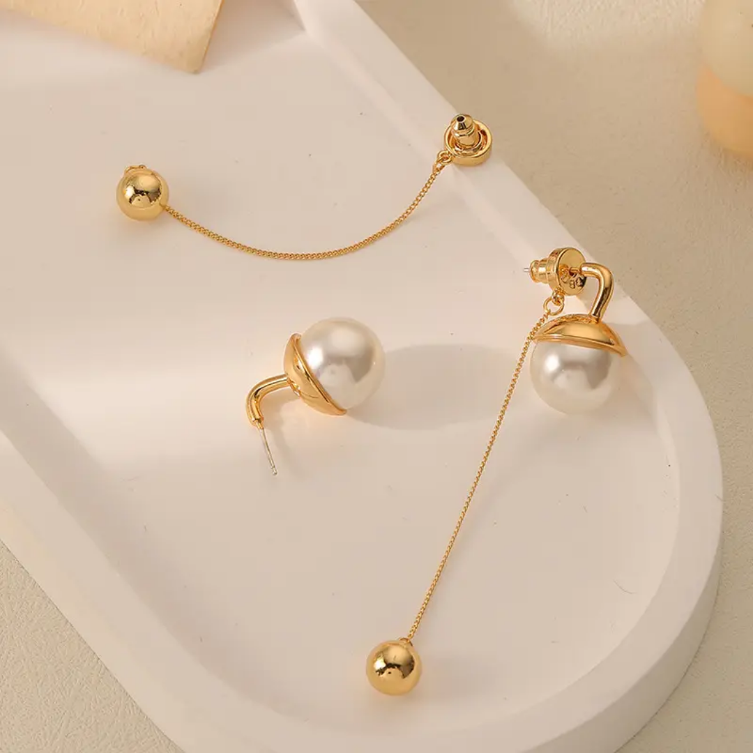 Harmonic arc earrings