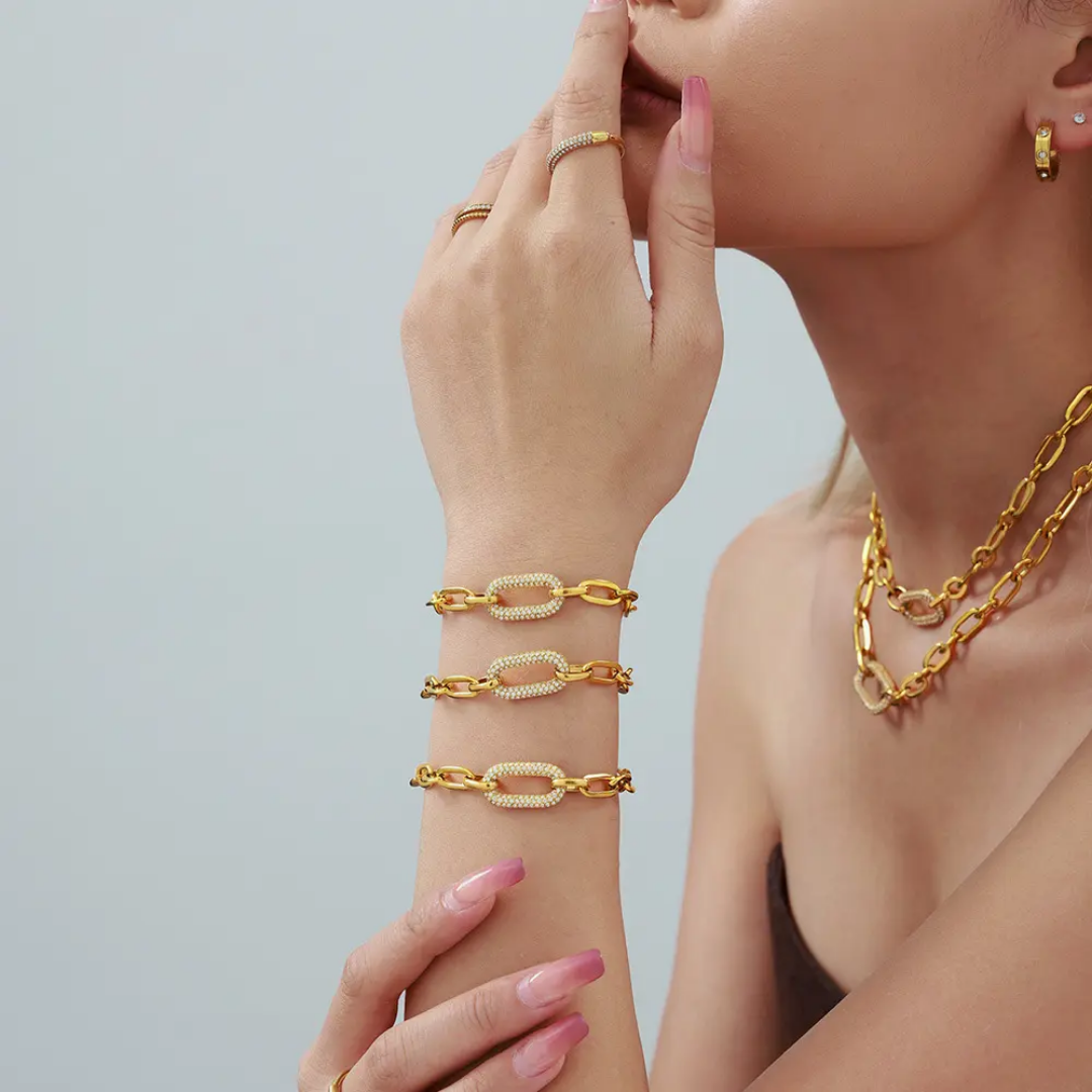 Model wearing TISA Dominion Chain Luxe Set – elegant 18k gold plated waterproof stainless-steel necklace set with zircon accents