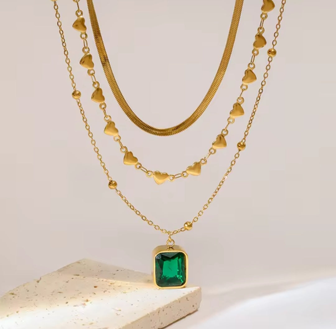 TISA Layered Emerald Necklace – 18K gold-plated stainless-steel necklace with green stone pendant, waterproof, tarnish-free, and safe for sensitive skin.
