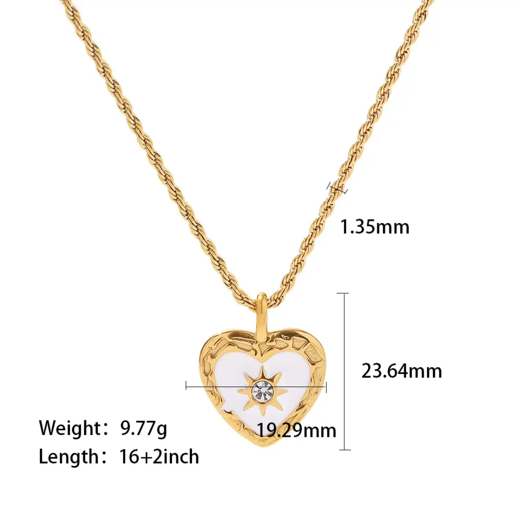 Tisa 18k Gold-plated heart pendant necklace with white enamel and a central clear zirconia, shown on a white background with overlaid dimensions and weight/length text.