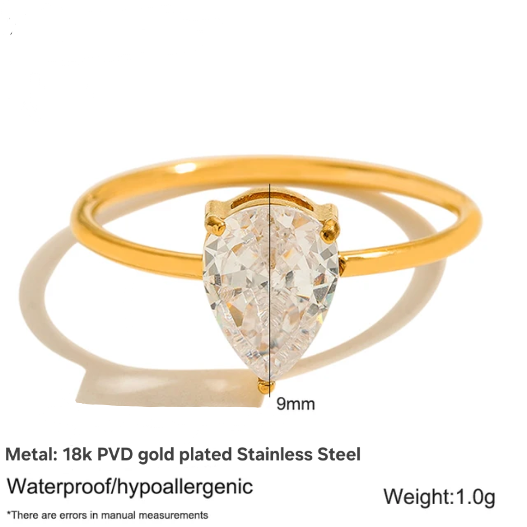 18k gold plated solitaire ring in a pear shaped zircon on a white background with dimensions