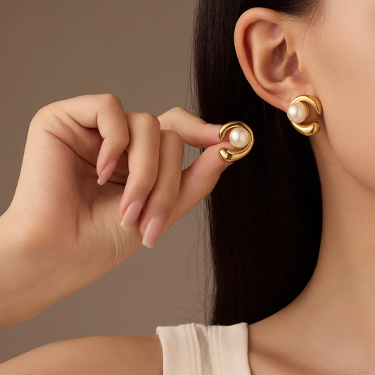 Model wearing TISA Sasha Pearl Earrings – elegant gold and pearl design, suitable for formal and everyday wear