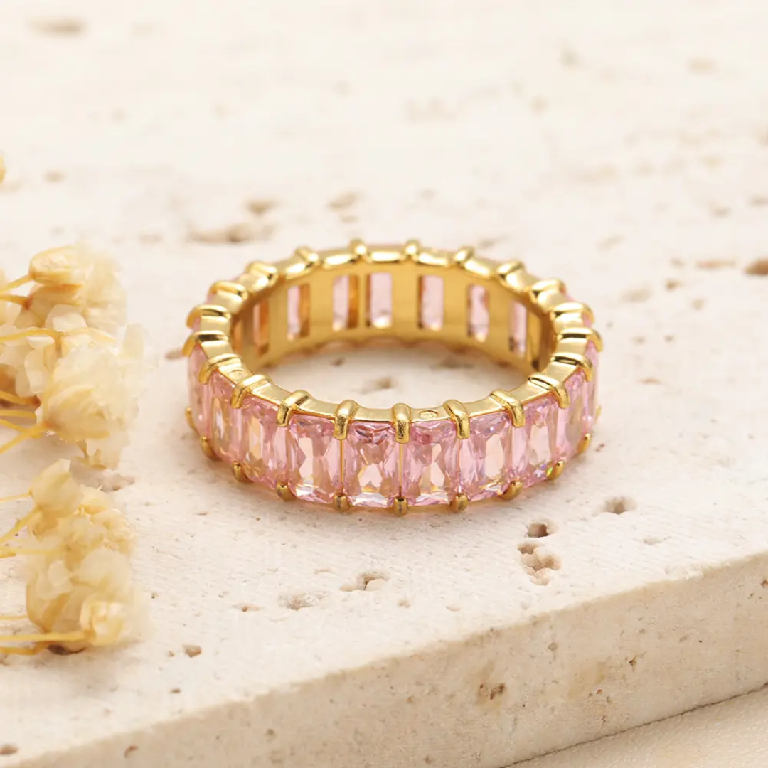 Baby pink cubic zirconia baguette eternity ring in 18K gold-plated stainless steel, hypoallergenic waterproof anti-tarnish.