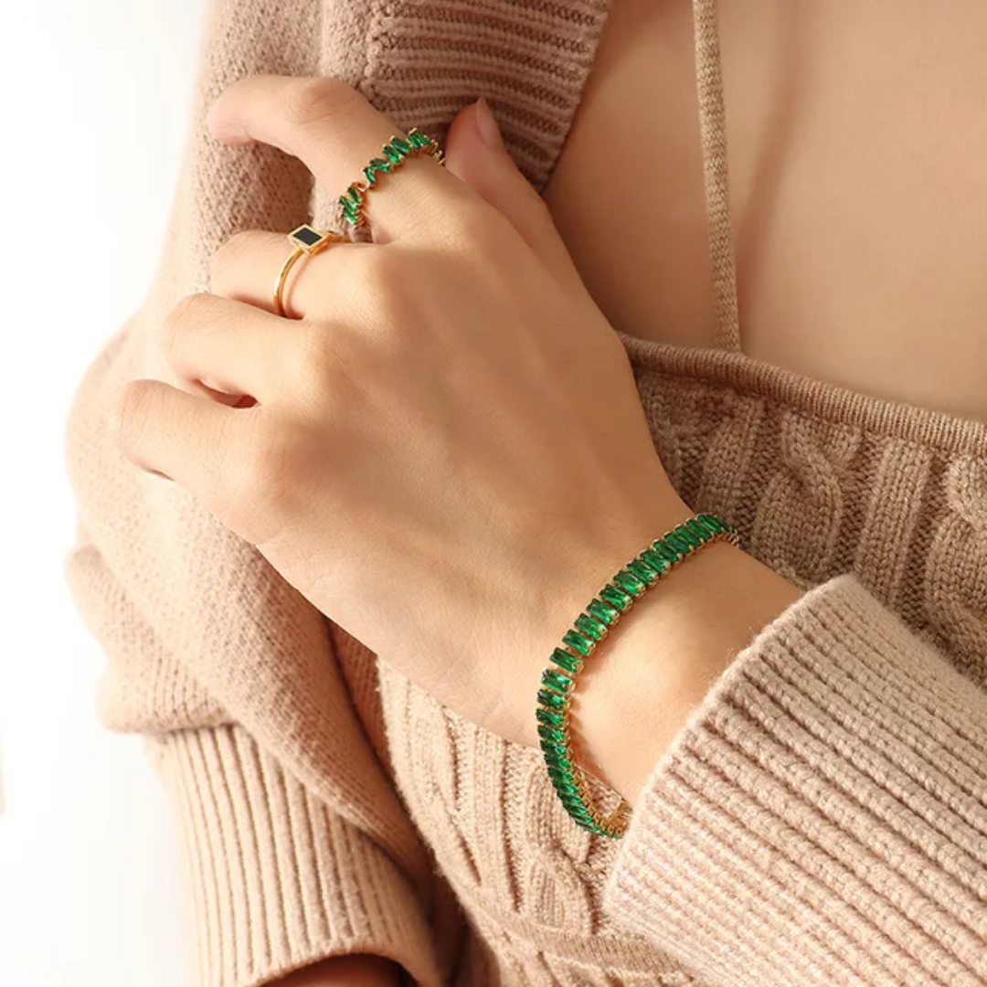 Emerald green cubic zirconia baguette tennis bracelet in 18K gold-plated stainless steel, hypoallergenic waterproof anti-tarnish.