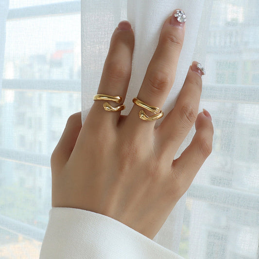 Model wearing The Hug Ring by TISA – elegant gold-plated wrap design symbolizing comfort, affection, and emotional connection.