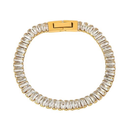 Clear cubic zirconia baguette tennis bracelet in 18K gold-plated stainless steel, hypoallergenic waterproof anti-tarnish.