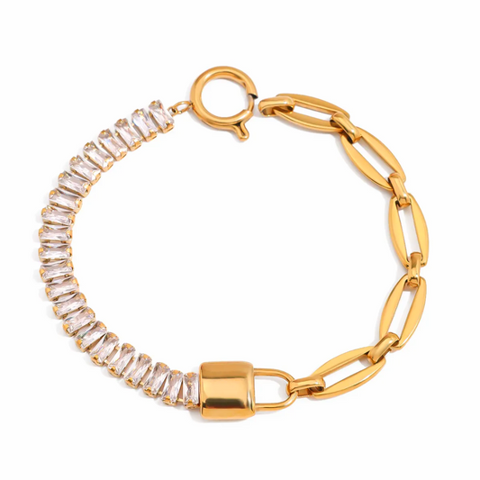 Tisa's 18k gold-plated bracelet with clear zircons and a lock on a white background.