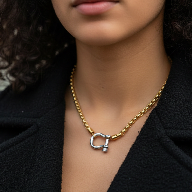 Horseshoe 18k Gold plated dual tone chain necklace with a lock detail worn by a female model