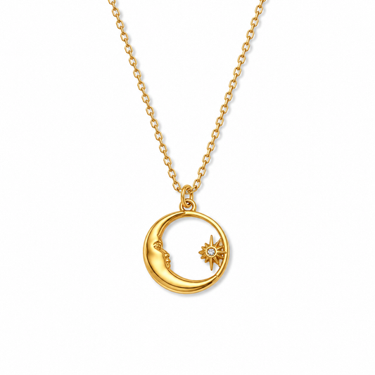 A 18k Gold-plated crescent moon and star pendant necklace on a delicate gold chain, shown against a plain white background.