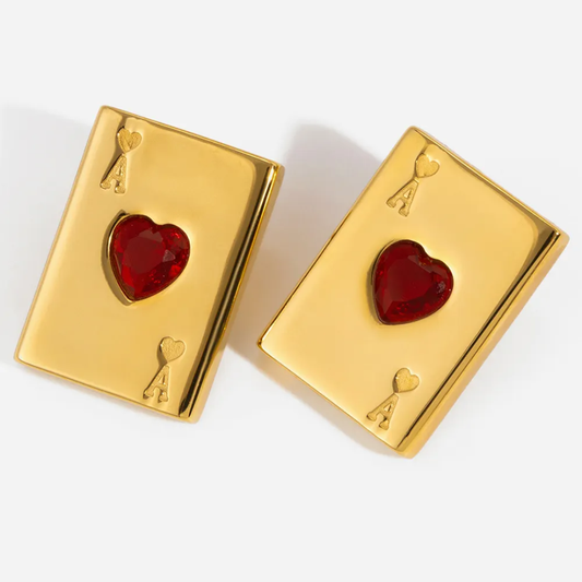 Tisa 18k Gold plated playing card-shaped poker earrings with red heart designs on a white background