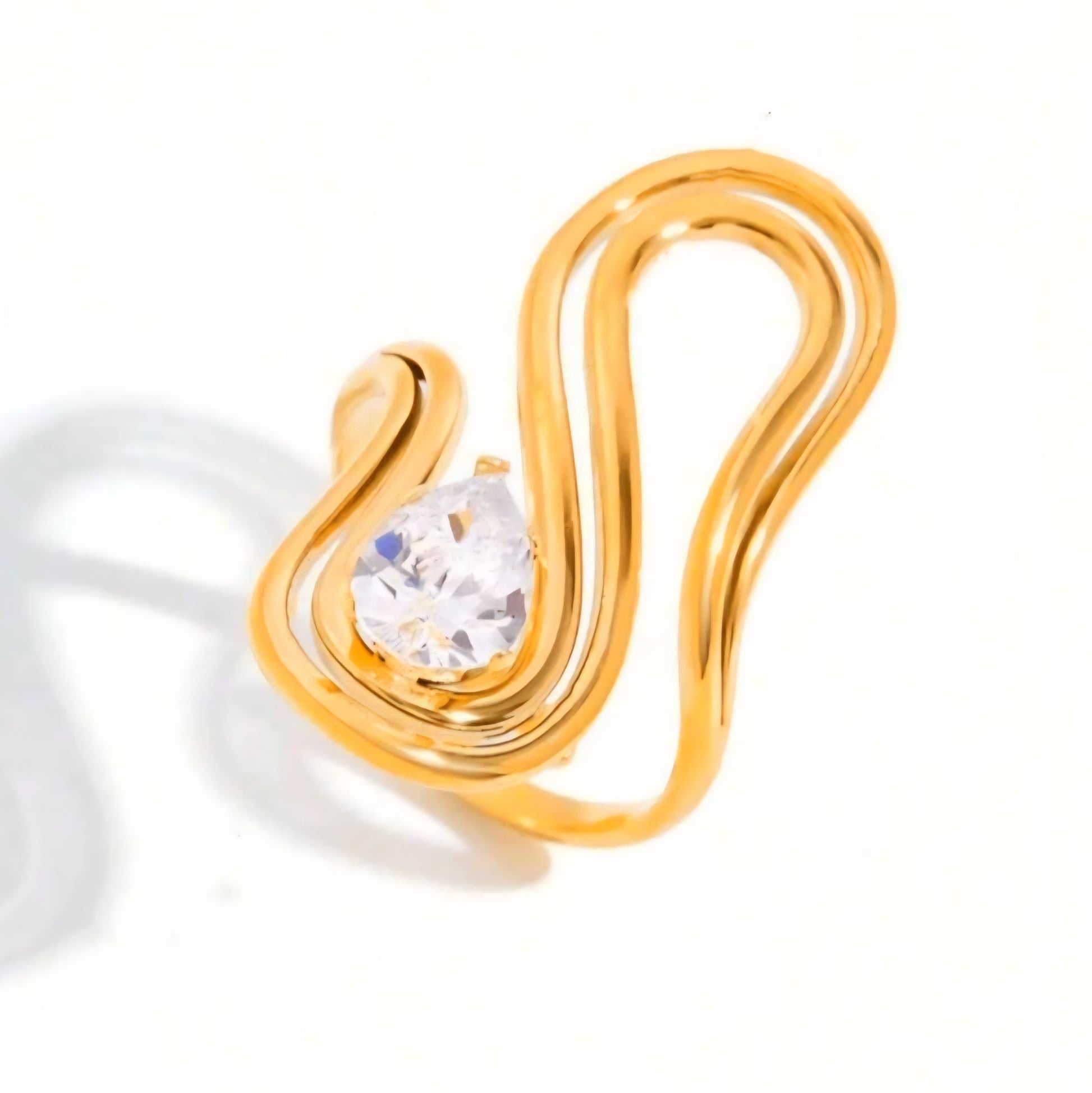 Velura Sculptural Solitaire Ring with pear-cut solitaire in 18K gold-plated stainless steel, adjustable, waterproof by Tisa.