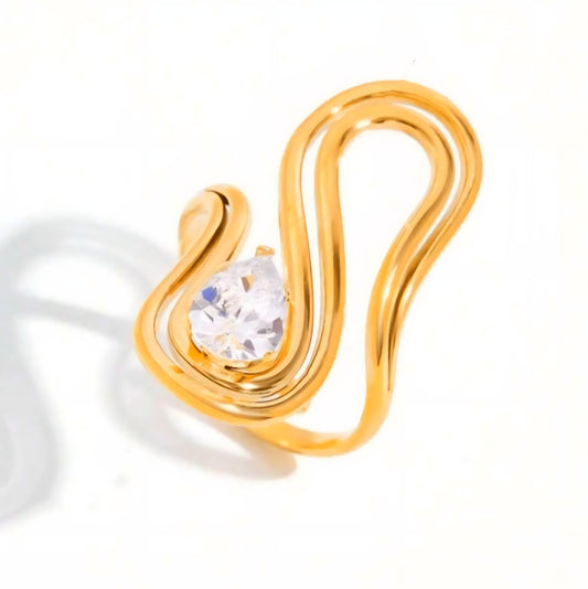 Velura Sculptural Solitaire Ring with pear-cut solitaire in 18K gold-plated stainless steel, adjustable, waterproof by Tisa.