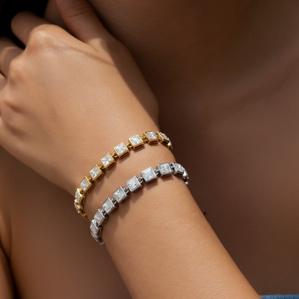 Model wearing Two Square tennis bracelets on her wrist 