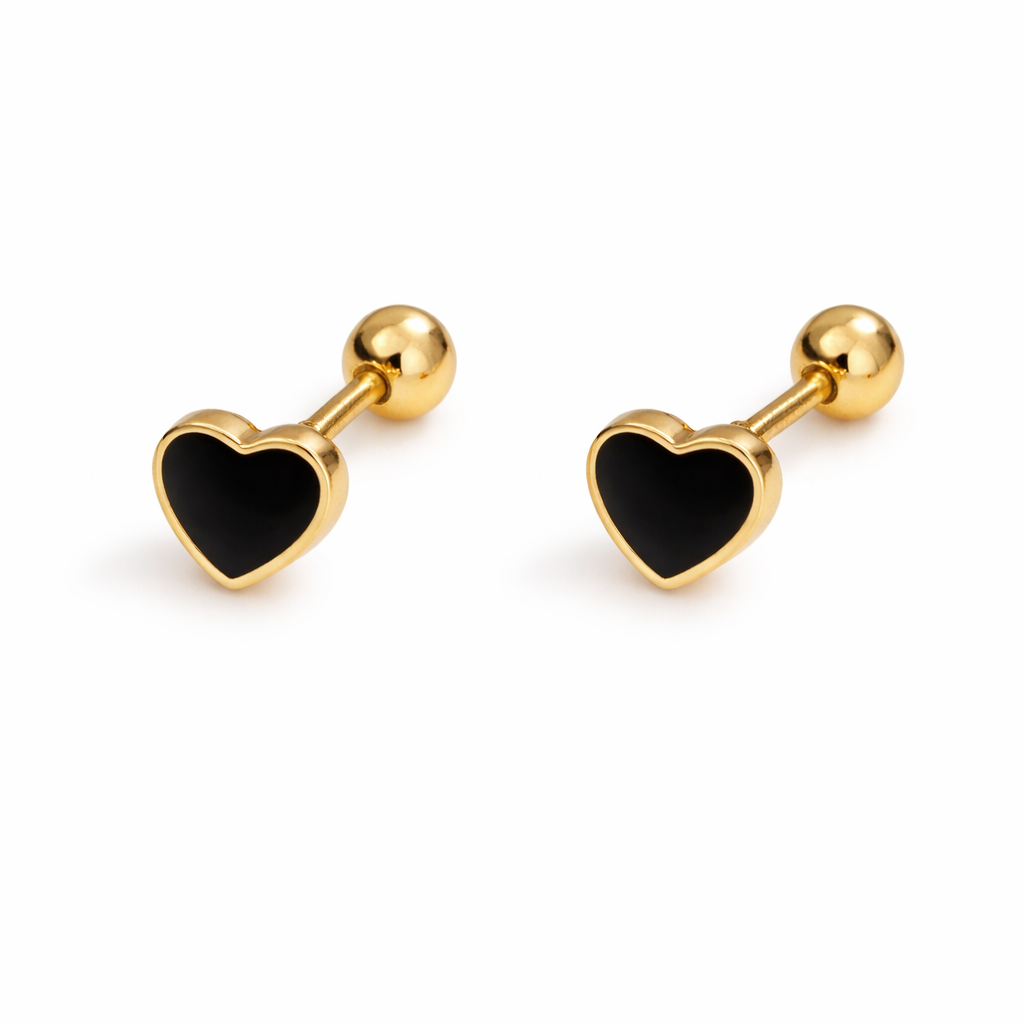 Gold heart-shaped earrings with black centers on a white background