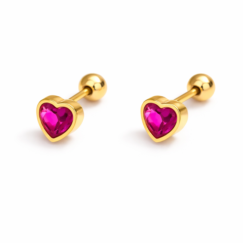 Gold heart-shaped earrings with pink gemstones on a white background