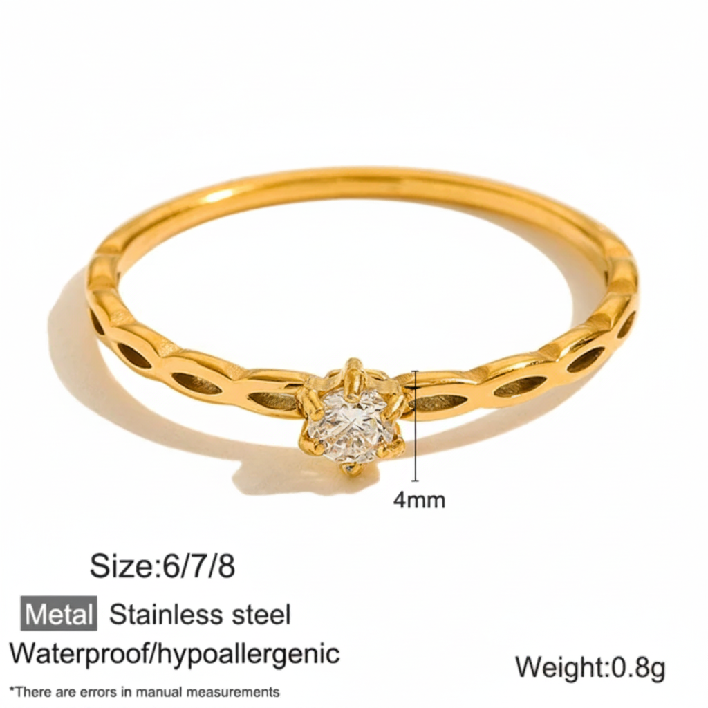 Gold ring with a zircon on a white background, showing measurements and material details.