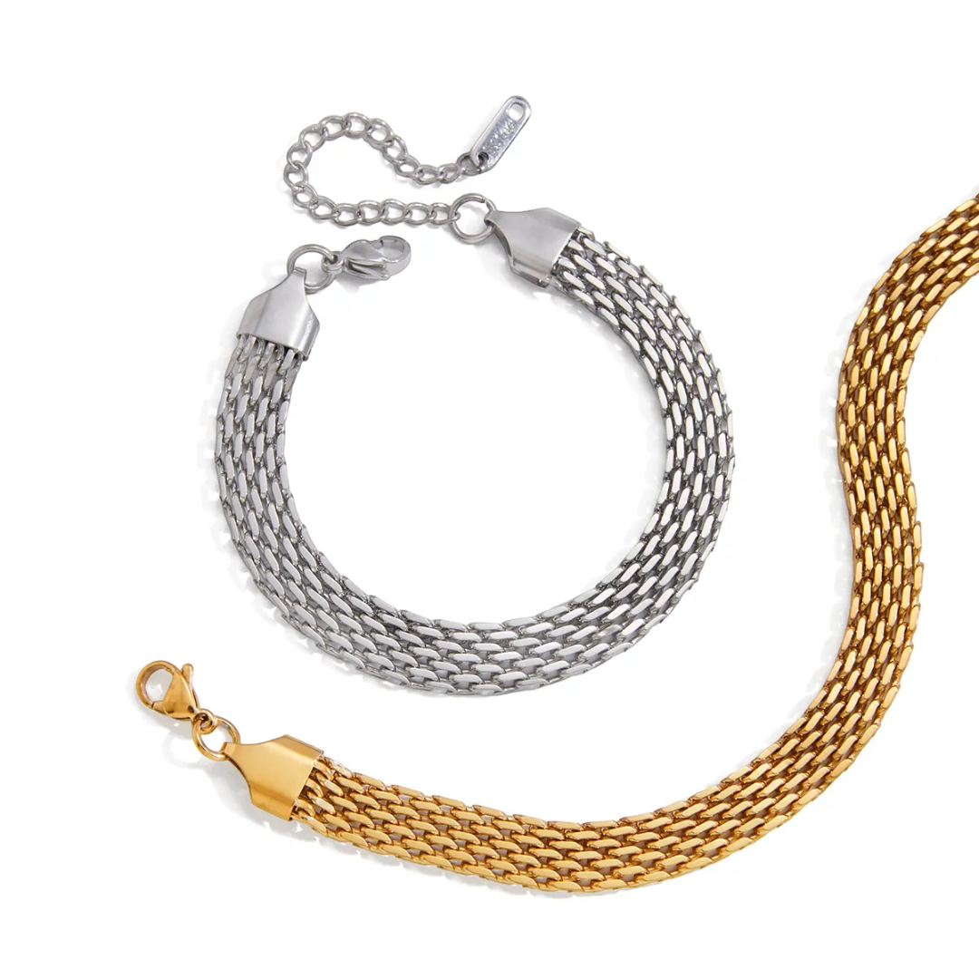 Two mesh chain unisex bracelets, one silver and one gold, on a white background.