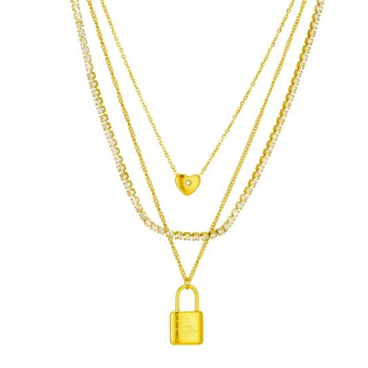 TISA Lustre and Love Necklace – Triple-layered 18K gold-plated stainless-steel necklace with zircon studs and lock pendant, waterproof and hypoallergenic.