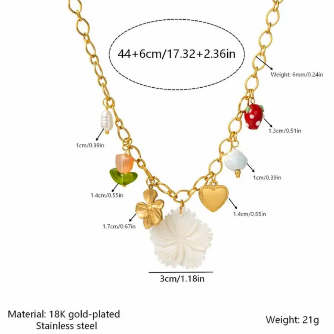 18 Gold-plated stainless steel charm necklace with a large white flower pendant and small decorative charms, shown with measurement labels and material information on a white background.